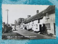 Vintage 1950s Burton Bradstock Village - Shop People Old Car Real Photo Postcard