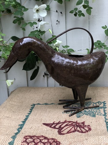 Bronze tone metal - tone, duck
