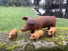 SET OF 4 METAL RUSTY CAST IRON