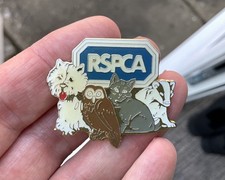 RSPCA pin badge Royal Society Animal Protection Charity. Dog Cat Owl Badger.