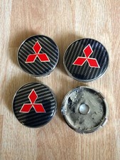 MITSUBISHI CARBON FIBRE 60MM ALLOY WHEEL CENTRE HUB CAPS ( 1 SET OF 4PCS  )