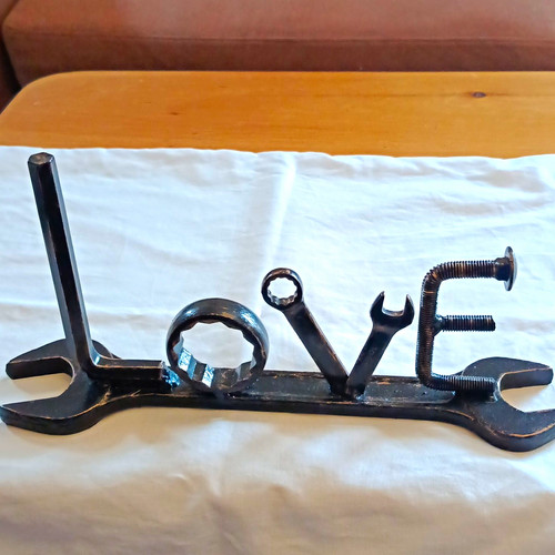 Scrap metal art love sign - sign, hand