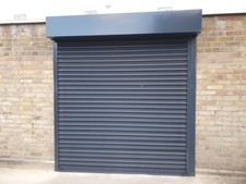 Burgundy garage door/ Mr paul