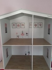 Designer Friends Dolls House with furniture, dolls and outfits.