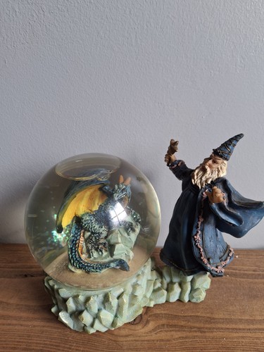 Mystic dragon and wizard - and,