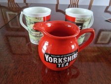 2 yorkshire tea collectable cups and milk jug