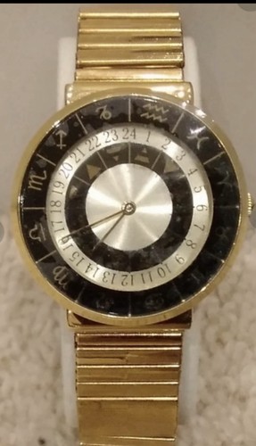 Swiss movement gold tone - movement,