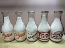 Lot Of 6 Quart Milk Bottles