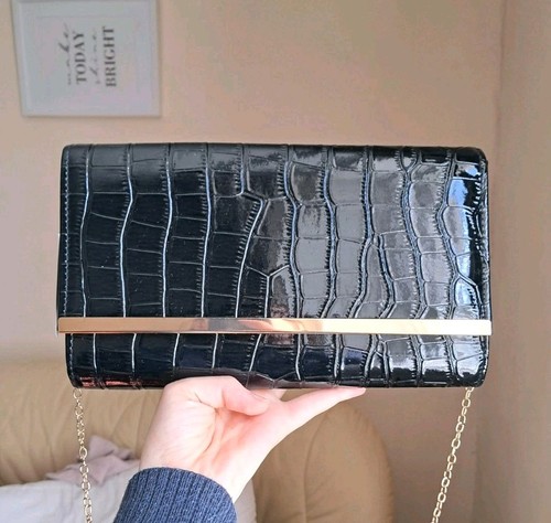 Black quiz clutch shoulder bag - black,
