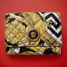 $675 VERSACE Tribute Yellow