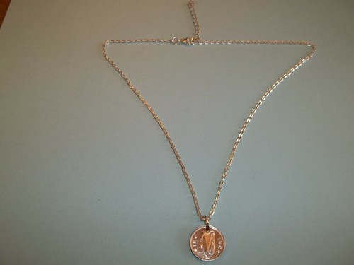 Three penny coin irish harp - three,