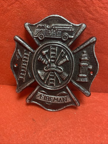 Fireman cast iron wall sign - fireman,