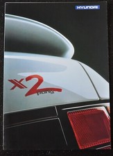 HYUNDAI PONY X2 SALOON & HATCHBACKS BROCHURE SEP 1990 ENGLISH TEXT. VGC