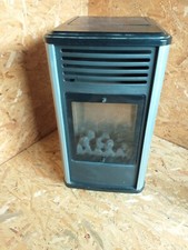 portable gas fire used coal effect behind glass shield for safety