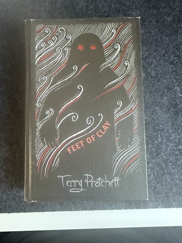 Feet clay discworld the - clay:, discworld: