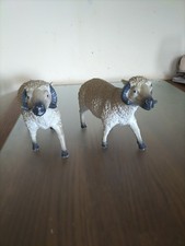 Pair Of Sheep Ornaments.