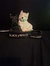 Black And White Scotch Whisky Statue