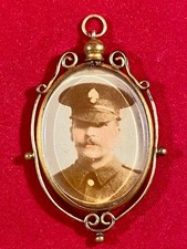 WW1 Sweetheart Gilt Brass Framed Glass Pendant with a Photo of a Royal Fusiliers