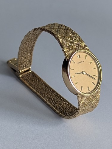 Omega ladies 9ct gold bracelet - omega,
