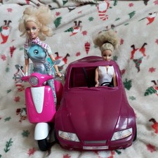 2 Barbie Dolls 1 Barbie Convertible Car And 1 Barbie Scooter Bundle