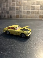 Vintage Corgi Toys 218 Aston Martin DB4, Yellow Model Car. 