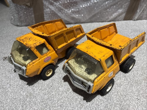 Pair vintage tonka tipper - pair,