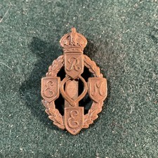 R E M E Cap Badges  gilded