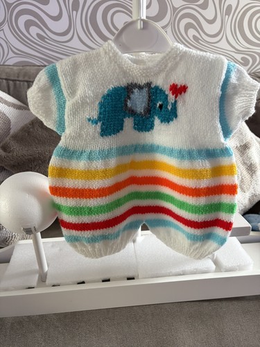 Hand knitted baby - hand,
