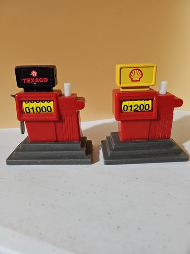Vintage toy gas pumps - gas,