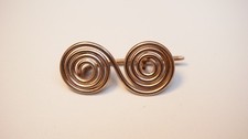 halstatt latene style double swirl bronze fibula