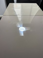 Glass Dining Table With An