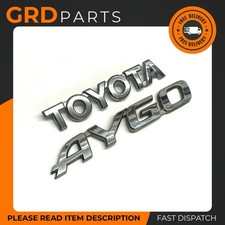 GENUINE TOYOTA AYGO MK1 REAR TAILGATE BOOT BUMPER BADGE EMBLEM LOGO CHROME USED