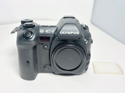 Olympus black digital slr - olympus,