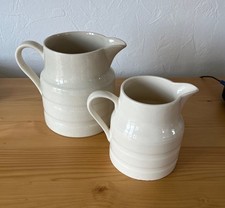 Vintage cream coloured Milk Churn jugs x 2