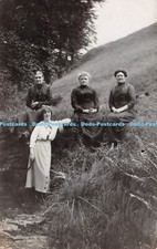 R251756 Three women in black