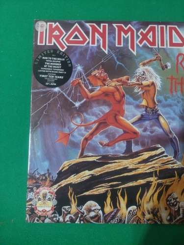 Iron maiden run to the - maiden,