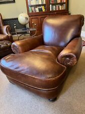 Fully reupholstered victorian brown leather deep armchair