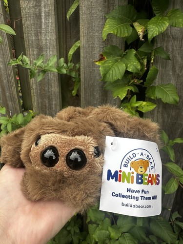 Build bear brown jumping - a,
