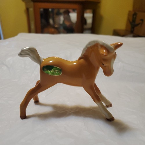 Beswick palomino foal figurine - beswick,