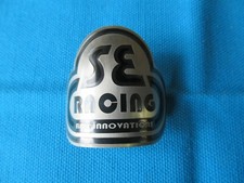 SE Racing BMX Head Badge 2-1/8" Wide, 1-1/2" High in Silver / Black - New