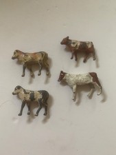 Vintage farmyard lead animals - 4 calves