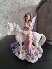 Fairy Sitting On Unicorn