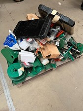 A Pallet of new and used Mower
