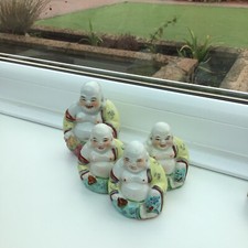 Antique Buddah figures x4