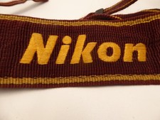 Nikon  burgundy wide shoulder