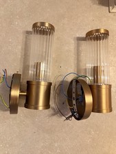 PAIR JOHN LEWIS ANTIQUE BRASS