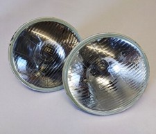PAIR OF CLASSIC 7″ LUCAS STYLE H4/ HALOGEN HEADLAMP/ DOMED TYPE (RHD - W/ PILOT)