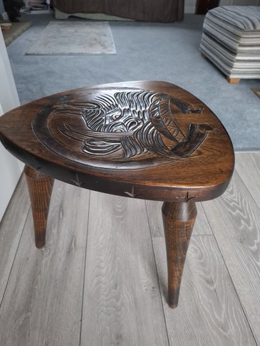 Carved three legged milking - carved,