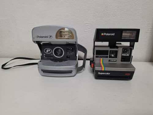 Pair vintage polaroid - pair,