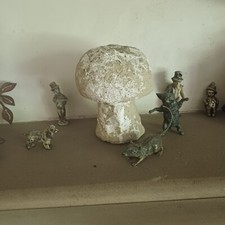 Little reconstituted stone mushroom